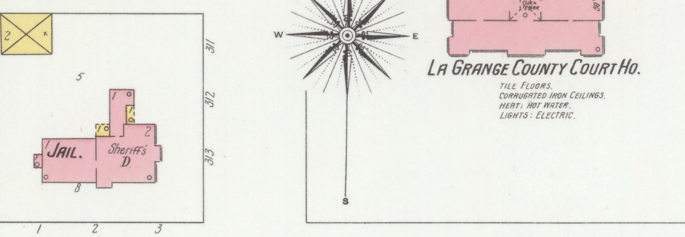 A detail from a 1901 fire insurance map of LaGrange. On the left, inside a fenced block numbered 311 to 313, two joined pink buildings lettered Jail and Sheriff's D. On the right, a larger pink building with a clock tower marked in its centre, lettered La Grange County Court Ho., with four notes below it reading tile floors, corrugated iron ceilings, heat hot water, and lights electric. A compass rose stands between the two blocks.