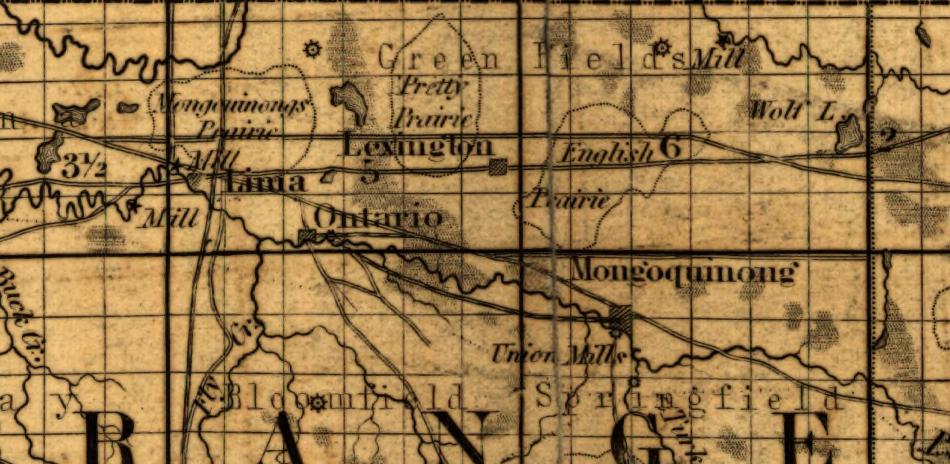 A detail from an 1852 map of Indiana showing the north of LaGrange County on a grid of numbered sections. At the left, in italic, the words Mongoquinongs Prairie sit beside the town of Lima. At the right, in upright letters, the word Mongoquinong labels a settlement symbol, and below it in italic the words Union Mills point to the same symbol. Lexington, Ontario, Green Fields Mill and the township names Bloomfield and Springfield are lettered around them.