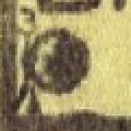 The symbol at Brighton, greatly enlarged: a circle mostly filled dark, the dark area's left edge irregular, a small light patch at its upper left, and no light ring inside the outline.