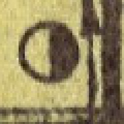 A discontinued post office symbol from the map, greatly enlarged: a circle with its right half filled dark and its left half open, divided by a straight edge.